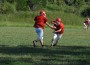 Osawatomie quarterback Seth Jones hands the ball off to Brant Johnson in a drill Monday afternoon.