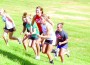 Kandice Firley, Shelby Allen, Marley Murrow, Tayler Soucie, Kenzie Nickell and Tabitha Diediker run the hill south of Lynn Dickey field during a volleyball team conditioning workout Monday afternoon.
