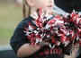 Jacie Roseberry performs a cheer during the Osawatomie football game Friday night.