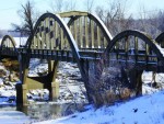 The Creamery Bridge built over the Marais des Cygne River on Osawatomie's north side in 1931 is one of eight triple rainbow arch bridges in Kansas.