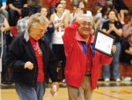 Osawatomie High School recognized Jean and Joe Vasquez for their years of support with the Kansas State High School Activites Association Award of Excellence Friday night during halftime of the boy's basketball game. The couple recently donated a new popcorn machine in memory of their son Jon Vasquez, a member of the class of 1986.