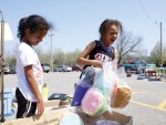 Pillows!  Look at all the pillows! Haley West and her sister, Jalyn West, of Osawatomie found a box full of pillows at the Pink Angels garage sale held at the Life Care Center of Osawatomie on Saturday. All proceeds will go to Relay for Life. By early afternoon, their team had already raised $800. Team members are: Nicki Tschantz, Tammy Farris, Rachel Manns, Stacy Hazlett, Pam Daniels, Tim Stephens, and Stacey Dozier.